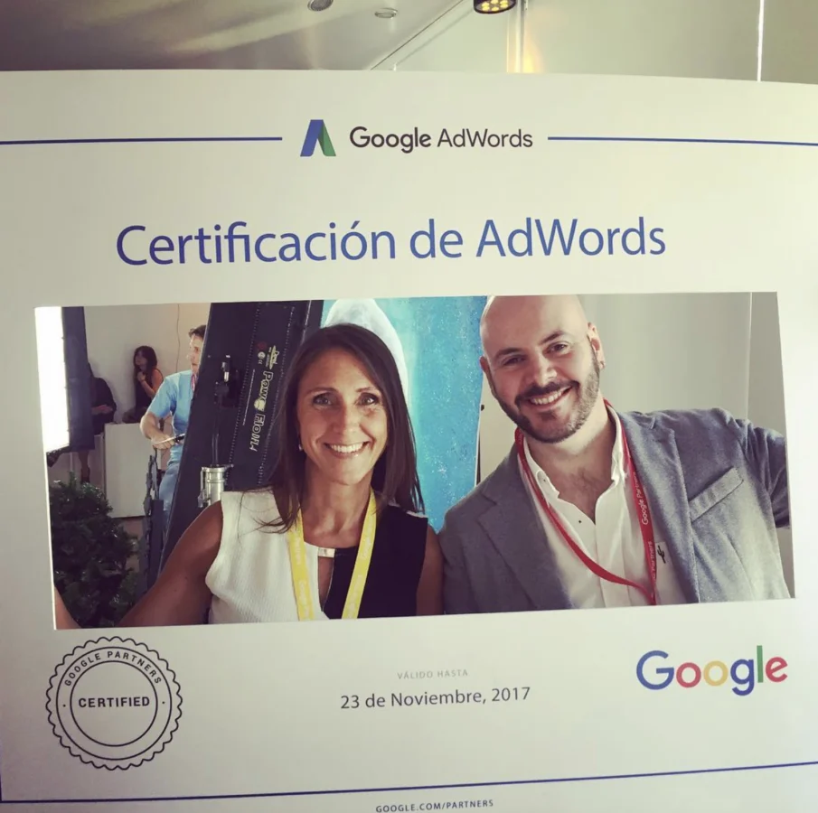 QKStudio team members next to the Google Ads certification sign