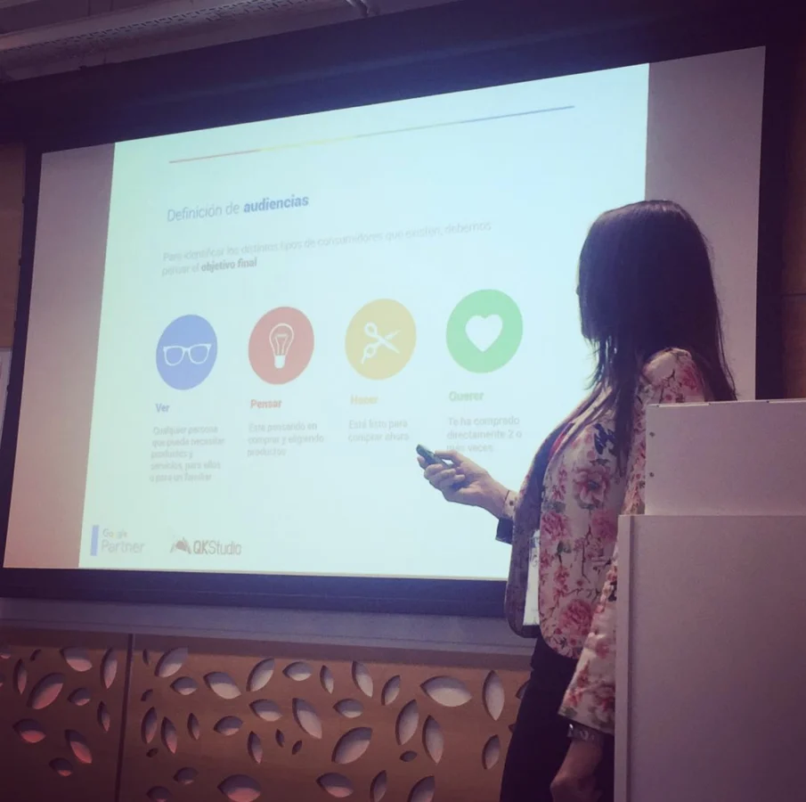 QKStudio presentation at an event, with a team member speaking